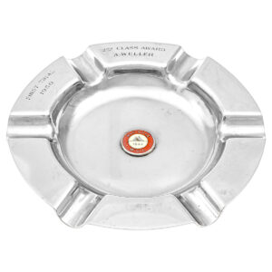 Ashtray trophy with lapel badge at centre Walsh collection